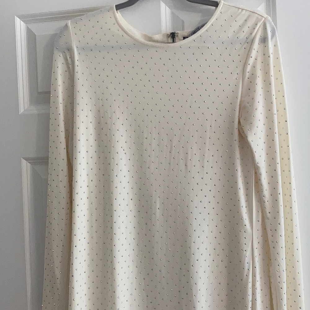 Cream with silver embellishments zipper full back